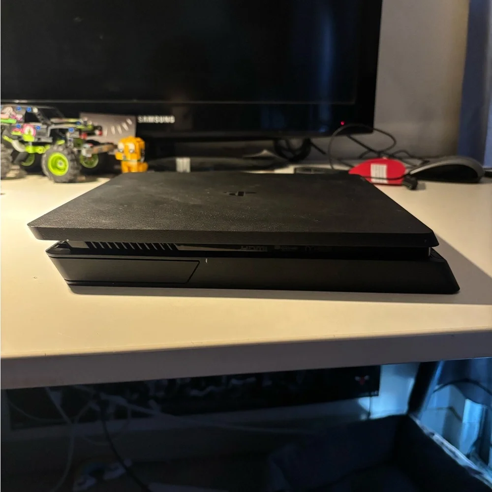 Sony Black Gaming Console with Controller